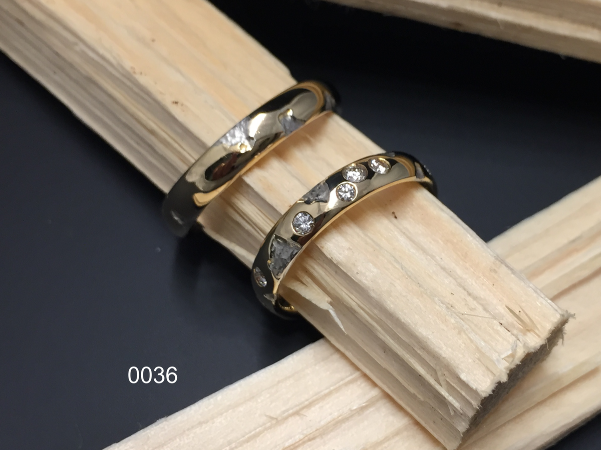 Trauringe aus dem Goldschmiedeatelier Wipf in Wil, Gelb-Weissgold mit Brillanten.